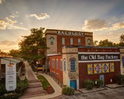 A photo of the Old Bag Factory at sunset.